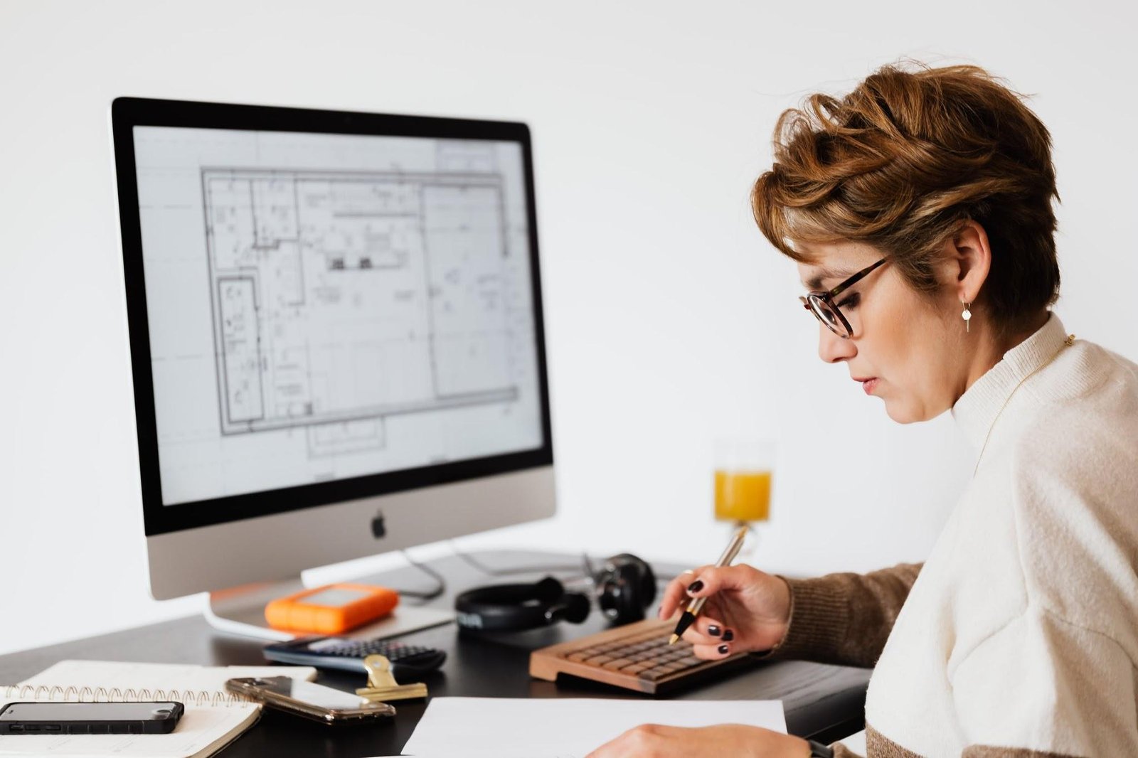 Woman working on iMac