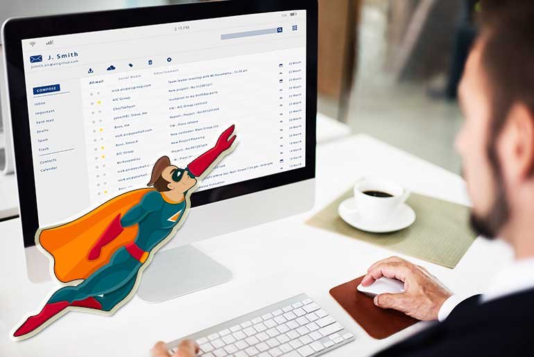 Person sitting in front a laptop with their email inbox open. A cartoon superhero is flying across the screen