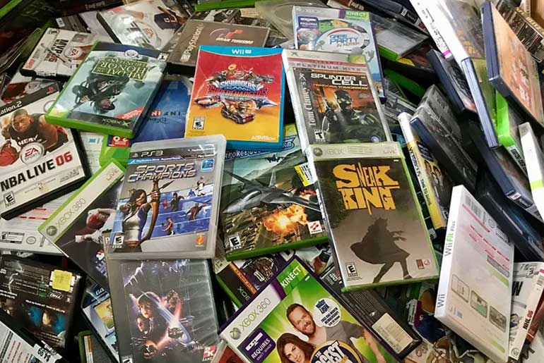 A pile of video games for various platforms