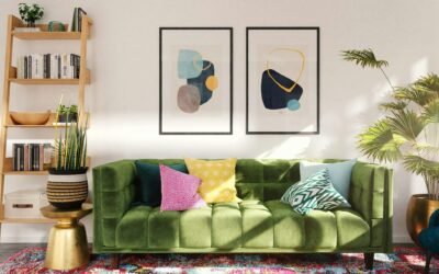 A bright green sofa with colourful cushions a striking prints on the wall